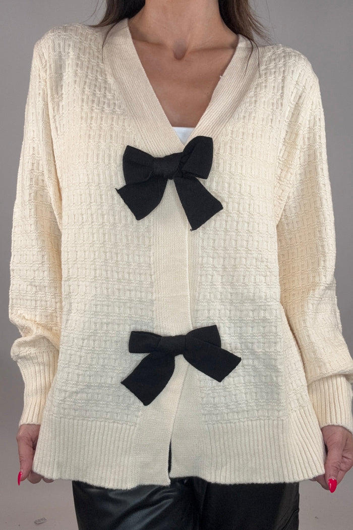 Style the Cream and Black Bow Cardigan exclusively at Born To Glam
