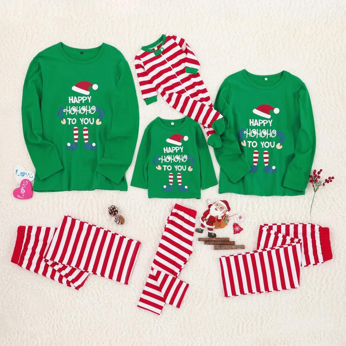 Matching family Christmas pajama flat lay with adult, child and baby holiday styles