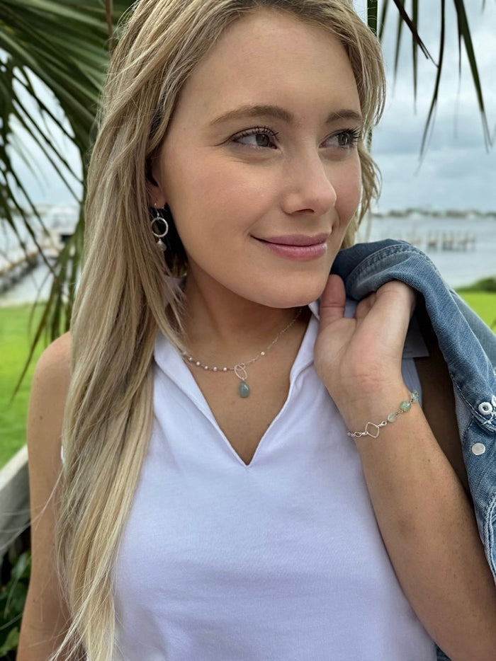 Sidney earrings styled on model