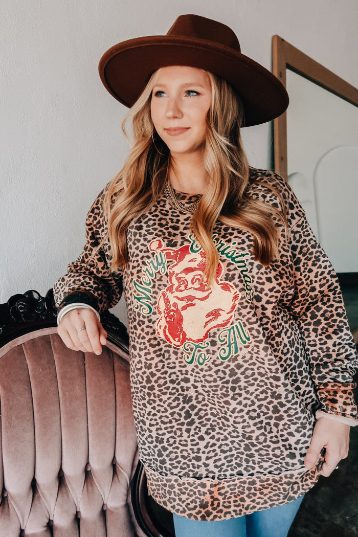 Style the Vintage Santa Leopard Scoop Sweatshirt exclusively at Born To Glam