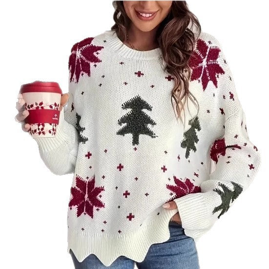 Close-up festive reindeer print on soft white holiday sweater fabric detail