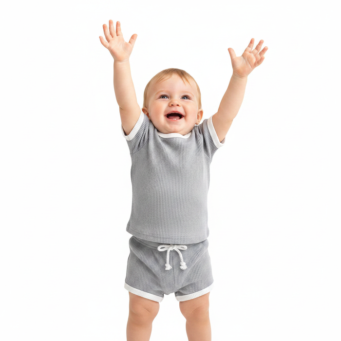 Baby outfits in sunshine yellow with matching 95% cotton top and pants, relaxed fit, and diagonal front closure for playtime.