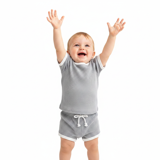 Baby outfits in sunshine yellow with matching 95% cotton top and pants, relaxed fit, and diagonal front closure for playtime.