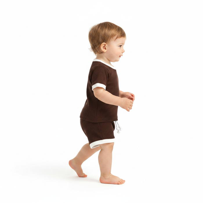 Non-hooded baby two-piece outfit in pearl white cotton with easy closure for gentle everyday baby wear