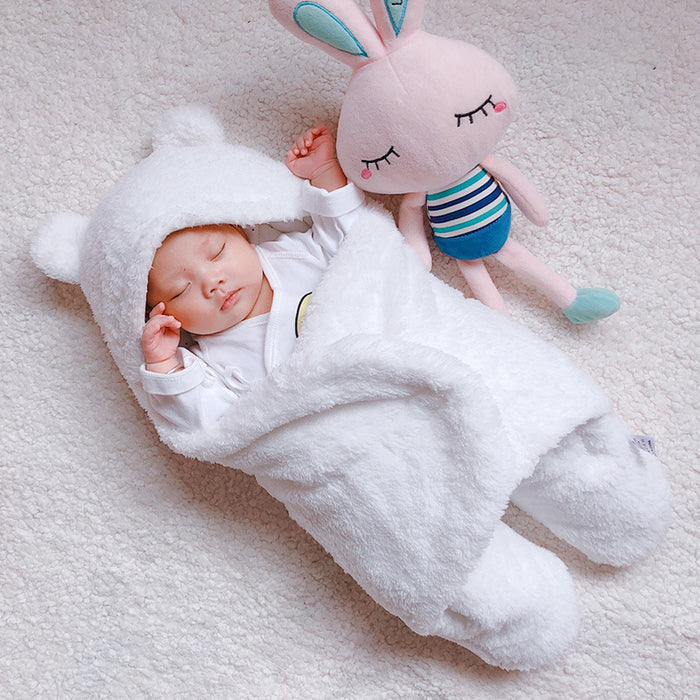 baby sleep sack winter neutral tones nursery environment