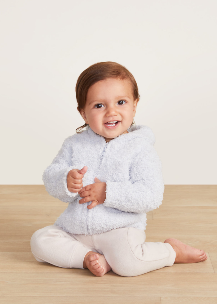 Baby wearing a blue hoodie