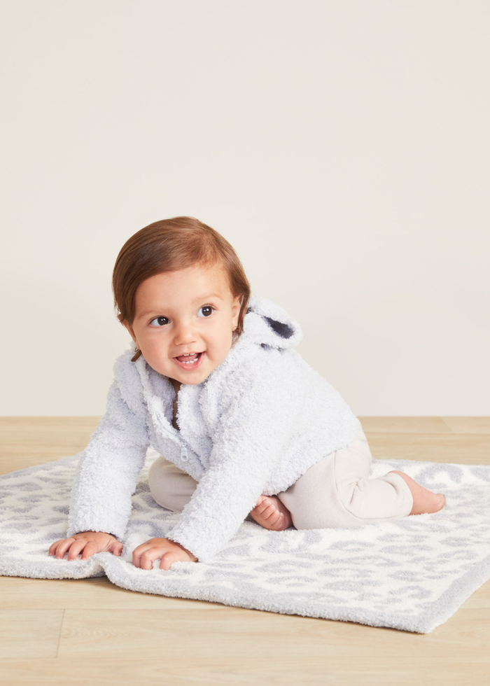 Baby wearing a blue hoodie