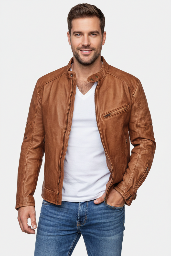Men's streetwear outfit with black leather-look jacket layered over a basic white tee