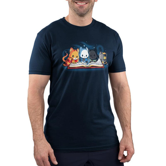 Premium Cotton T-shirt_TeeTurtle navy blue Books Are Magic. Featuring a cat with a red and yellow scarf, a cat with a blue and black scarf, a cat with a green and black scarf, and a cat with a yellow and black scarf reading the same book together.