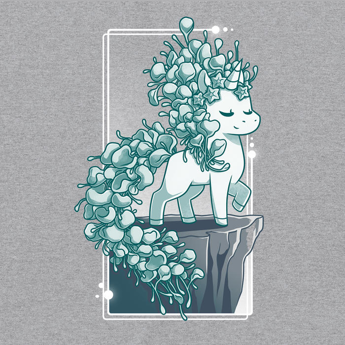 Classic Cotton T-shirt_TeeTurtle heather gray Botanicorn apparel featuring a magical unicorn with a mane and tail made out of the plant silver falls, or silver nickel vine, standing elegantly with a hoof raised on a cliff.
