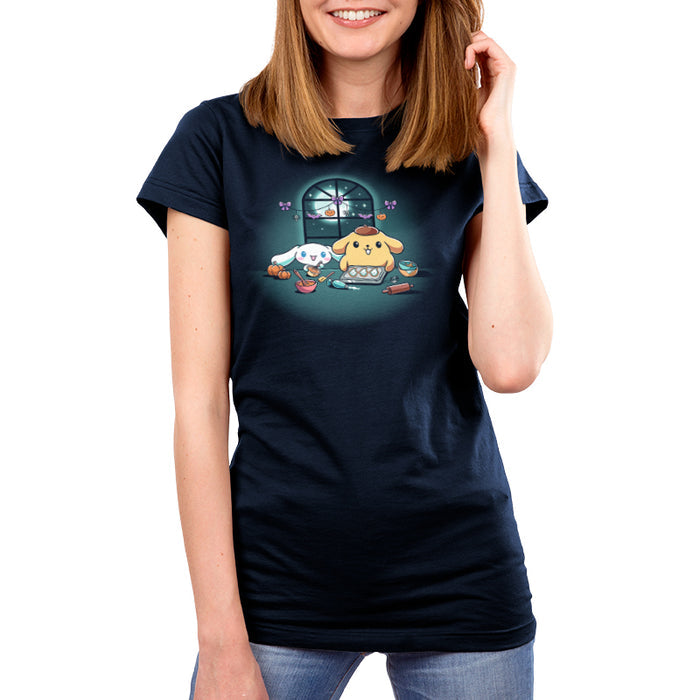 Premium Cotton T-shirt_TeeTurtle navy blue Cinnamoroll and Pompompurin's Halloween Baking apparel featuring Cinnamoroll and Pompompurin baking ghost cookies with pumpkins and Halloween hanging decoration in the back on top of the window that looks out to the full moon and stars.