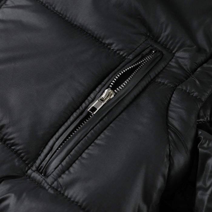 Close-up of a black puffer jacket zipper