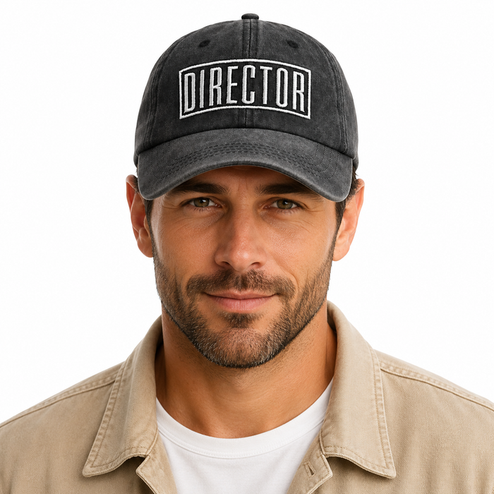 Filmmaker hat lifestyle shot with clean front embroidery and curved visor