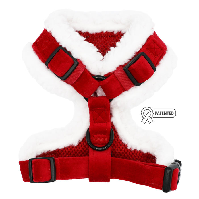 The Sassy Woof Dog Adjustable Harness - Naughty features red velvet, white faux fur trim, black buckle clips, mesh fabric, a patented badge icon on the right side, H-shape design—ideal as a holiday dog accessory.