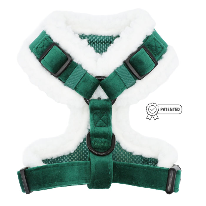 The Sassy Woof Dog Adjustable Harness - Nice features a green and white sherpa design with plush fleece lining, adjustable black straps and buckles, plus a “patented” badge—ideal for cozy holiday dog accessories.