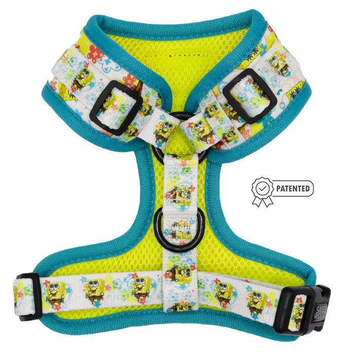 The Sassy Woof Dog Adjustable Harness – SpongeBob SquarePants™ Bikini Bottom features a yellow and blue design with cartoon characters, perfect for SpongeBob fans.