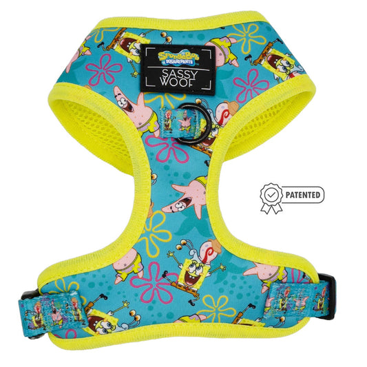 The Sassy Woof Dog Adjustable Harness - SpongeBob SquarePants™ Jelly Fishin' is turquoise and yellow, features SpongeBob and Patrick with pink flowers, a “Patented” badge, Sassy Woof label, and is part of the Puppy Growth Pawtection Plan.