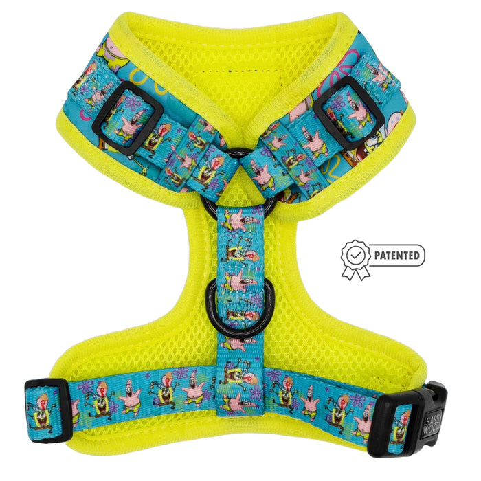 The Sassy Woof Dog Adjustable Harness - SpongeBob SquarePants™ Jelly Fishin’ features blue straps with cartoon characters, bright yellow mesh padding, multiple adjustment points, black buckles, and the Puppy Growth Pawtection Plan for comfort.