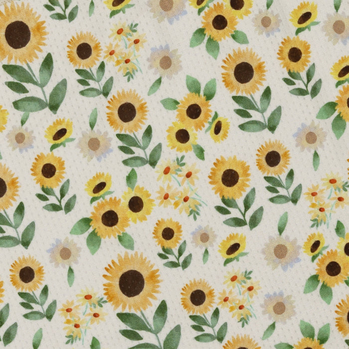 Featuring a cheerful pattern of hand-painted sunflowers and green leaves on white, the Sassy Woof Dog Bandana - Sunflower Dreams is a playful, lightweight accessory—perfect for adding summer vibes to your pup's outdoor adventures.