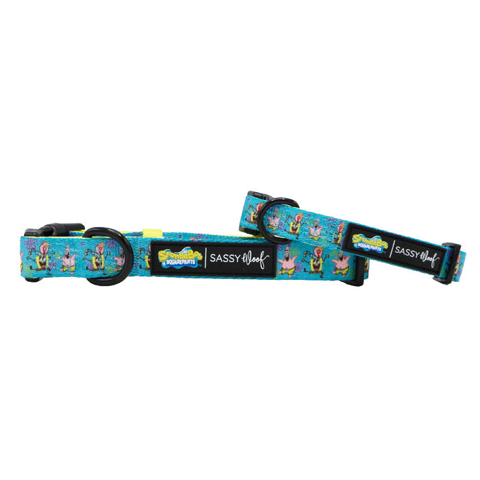 Two vibrant, turquoise Sassy Woof dog collars feature playful SpongeBob SquarePants™ Jelly Fishin’ prints and sturdy black hardware, perfect for fans of fun, cartoon-inspired styles.