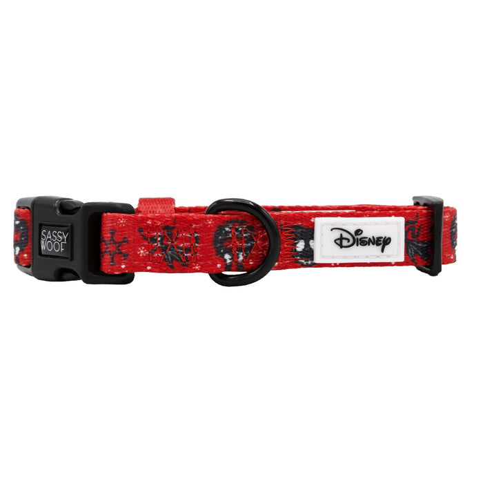 The Sassy Woof Dog Collar - The Nightmare Before Christmas™ (Red) features an adjustable fit, black buckle and D-ring, Disney-themed character outlines, brand tag, and Disney logo—ideal for fans of The Nightmare Before Christmas.