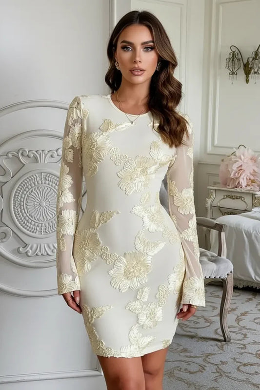Floral embroidered mesh mini dress in yellow shown from front with long sleeves, round neck and lined body for occasion wear.