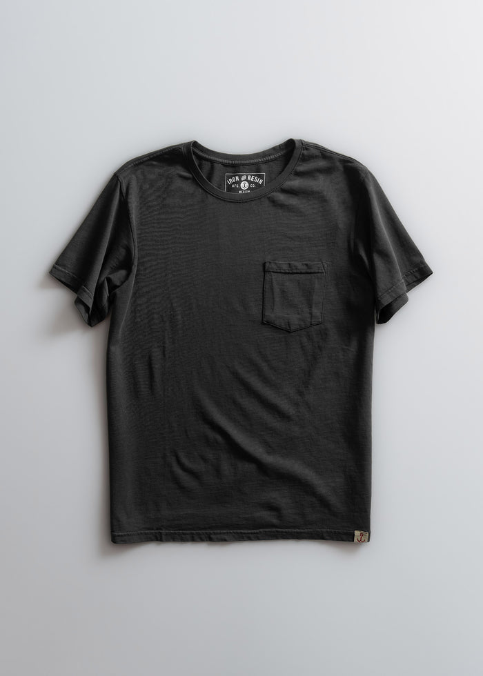 Black T-shirt with a chest pocket, featuring a simple design. The label reads "Iron & Resin Co." against a light gray background.