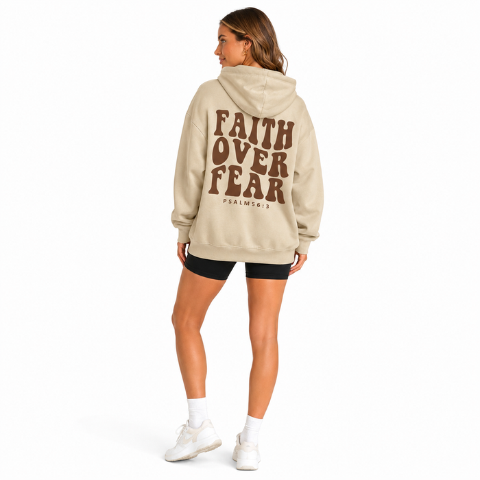 Women casual hoodie with relaxed dropped shoulders, simple silhouette, and faith over fear statement for confident daily wear