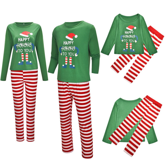 Green family Christmas pajamas with festive long-sleeve tops and red-white striped pants