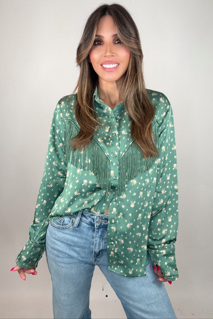 Olive floral button down shirt with a collared neckline, long sleeves, and western-inspired fringe detail.