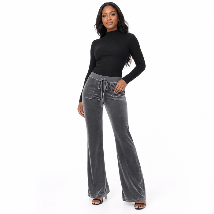 Flared trousers women in black with a mid-waist bootcut shape polished office style and flexible micro-elastic polyester fit.