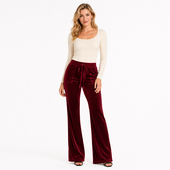 Women velvet flared trousers with a flexible fit, wide waistband and longer bootcut legs for office and smart-casual outfits.