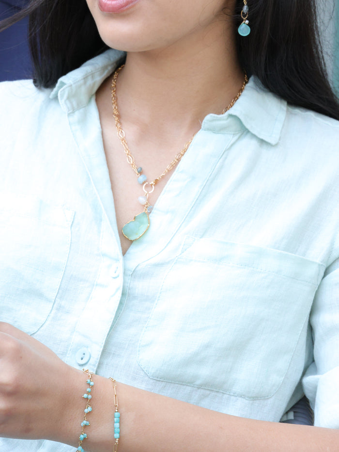 Amazonite tiny stones bracelet paired with necklace and earrings on model