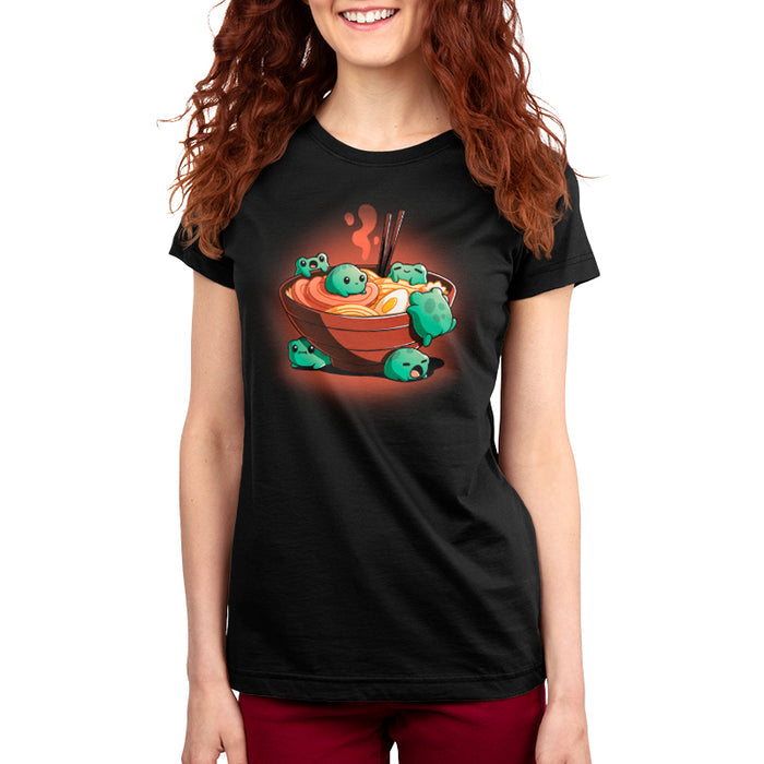 Premium Cotton T-shirt_TeeTurtle black Froggy Ramen apparel featuring a group of round green frogs in various playful poses around a steaming bowl of ramen.