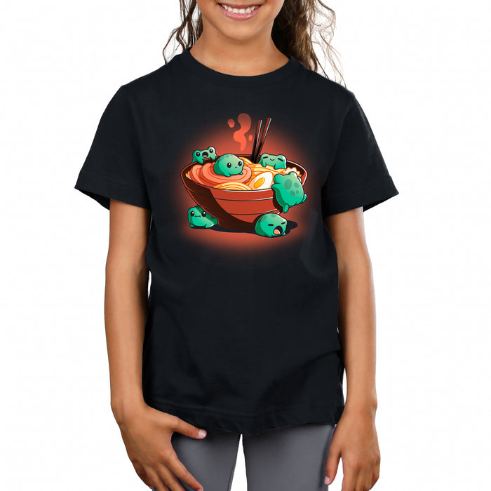 Premium Cotton T-shirt_TeeTurtle black Froggy Ramen apparel featuring a group of round green frogs in various playful poses around a steaming bowl of ramen.