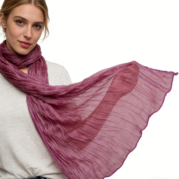Close-up view of the grey scarf showing the fabric texture and finish to help shoppers compare the accessory before purchase.