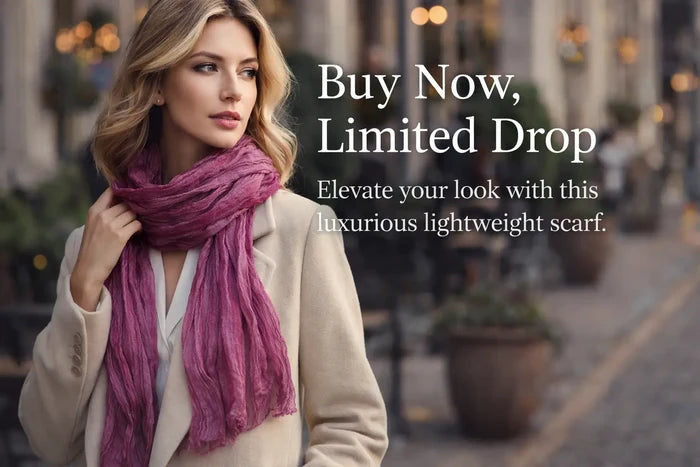 Minimalist grey scarf layered with a trench coat, showing the narrow profile in an urban outfit for clear product comparison.