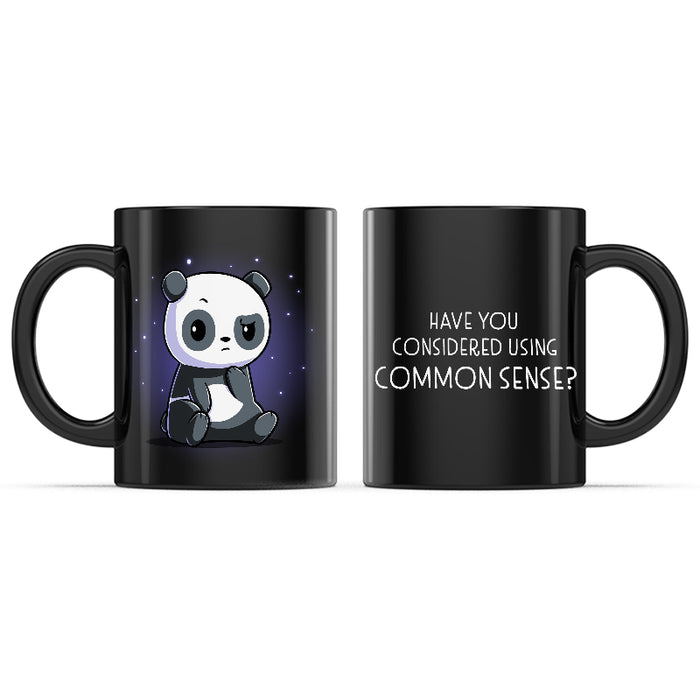 Ceramic Mug_TeeTurtle Have You Considered Using Common Sense? black mug featuring a panda with a raised eyebrow and sarcastic expression.
