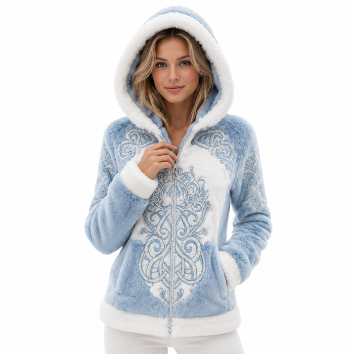 Hooded winter coat for women in glacier blue with white trim, ornate front pattern, zipper closure, a hood and front pockets.