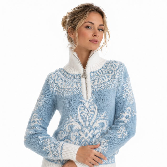 Front view of women's blue hooded winter coat with white trim, ornate pattern, center zipper, long sleeves and pockets shown.