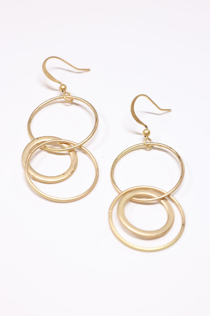 interlock hopps in matte gold on flat lay