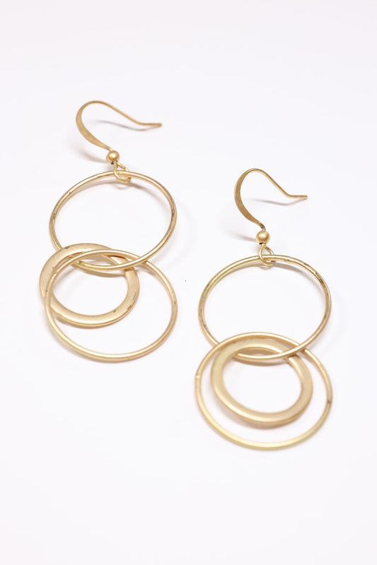 interlock hopps in matte gold on flat lay