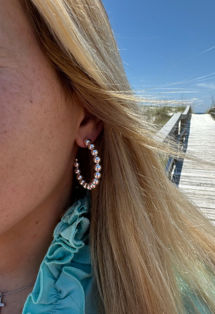 Isabella Silver Hoops shown on model