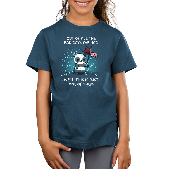 Premium Cotton T-shirt_TeeTurtle denim blue Just Another Bad Day apparel featuring an anxious panda holding a blown-out umbrella in a rainstorm with the caption, “Out of all the bad days I’ve had… well, this is just one of them“.