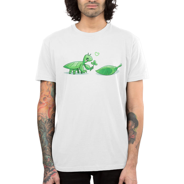 Premium Cotton T-shirt_TeeTurtle white Leaf Bug Love Story apparel featuring a leaf insect presenting a three-leaf clover to a leaf.