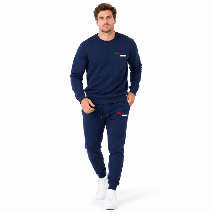 Close view of men's fleece joggers showing elastic drawstring waistband, two side pockets and ribbed ankles in a matching set