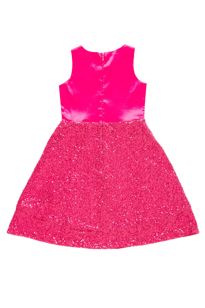 Pink dress with glittery skirt on a white background