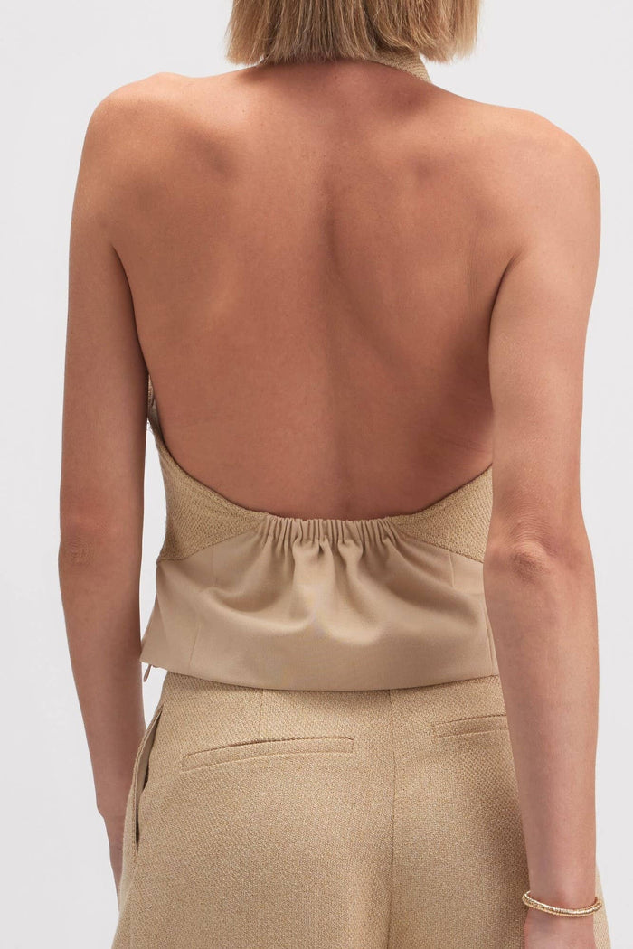 Style the Mixed Media Open Back Halter Top exclusively at Born To Glam