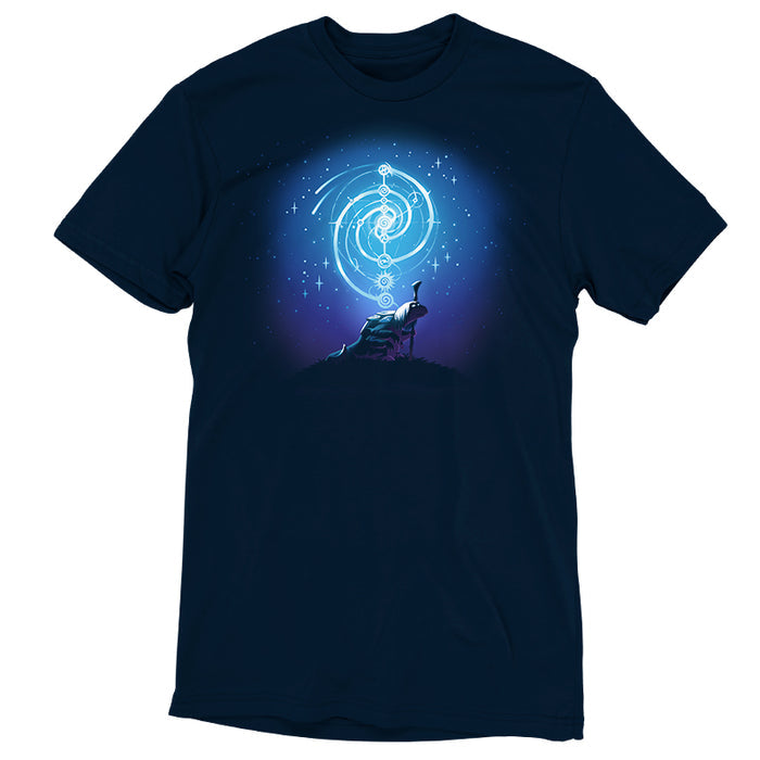 Premium Cotton T-shirt_TeeTurtle navy blue Mystical urRu apparel featuring an urRu holding a staff on a hilltop looking into the distance with mystical celestial circular patterns above it against a starry background.