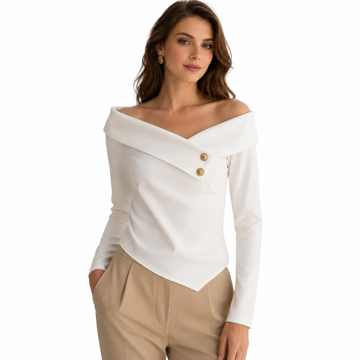 Off shoulder long sleeve top in white with folded neckline, gold button detail, and tailored styling for elegant work outfits